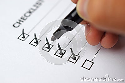 Pen over filled checkboxes Stock Photo