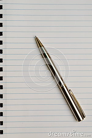 Pen over paper Stock Photo