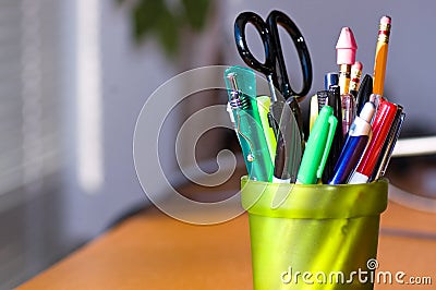 Pen and Pencil Holder on Desk Stock Photo