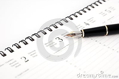 Pen and Planner Stock Photo