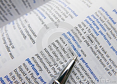 Pen pointing on performance word Stock Photo