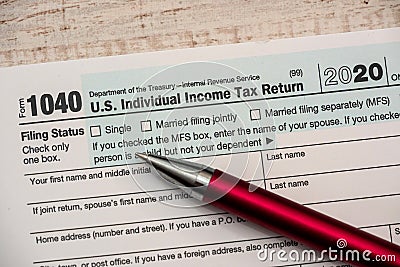 Pen on usa 1040 individual tax form Editorial Stock Photo