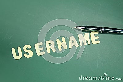 pen and wooden letters with the word username. Business Online Stock Photo