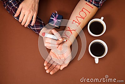 Pen write letter dear red i love you hand coffee cup gift box brown Valentine`s Day Stock Photo