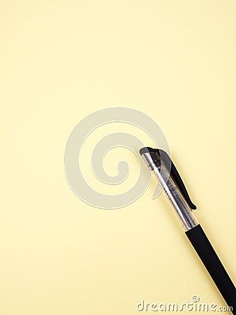 The pen on yellow sheet Stock Photo