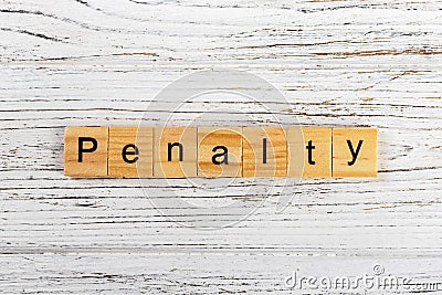 Penalty word made with wooden blocks concept Stock Photo