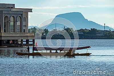 Penambang boat view from Darul Hana Bridge at Sarawak River Editorial Stock Photo