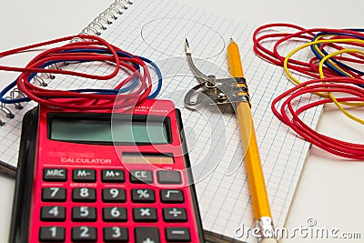 Pencil and compass, notebook and calculator on a white background Stock Photo