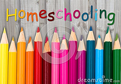 Pencil Crayons with text Homeschooling Stock Photo