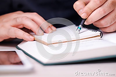 Pencil Erasing on Notebook Stock Photo