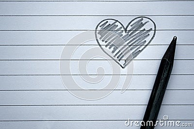 Pencil heart on a sheet of paper Stock Photo