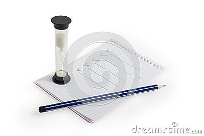 Pencil, notebook and hourglass Stock Photo