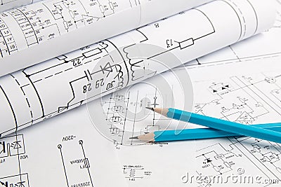 Pencil on printed drawings of electrical circuits Stock Photo