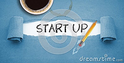 Blue paper work and Pencil rocket metaphor for start up and business Stock Photo