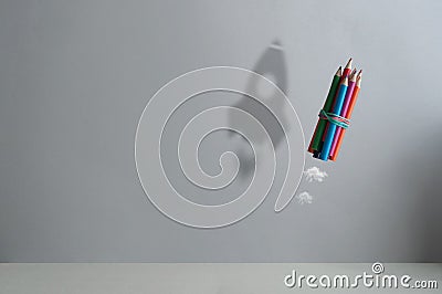 Pencil rocket success shadow concept Stock Photo