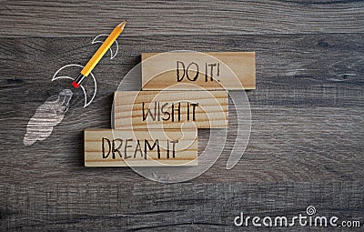 Pencil rocket withg business message Dream it, Wish it, Do it Stock Photo