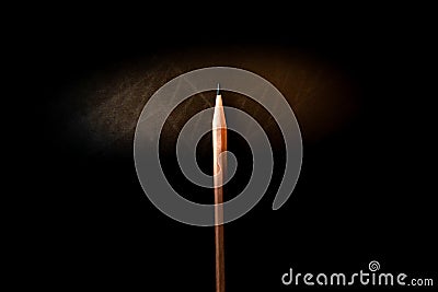 A pencil that stands out from the light and shadow that looks simple but shows strength, endurance, and leadership Stock Photo