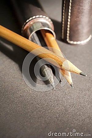 Four pencils in a pencil case Stock Photo