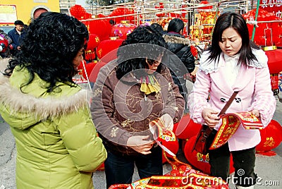 Pengzhou, China: Buying New Year Decorations Editorial Stock Photo