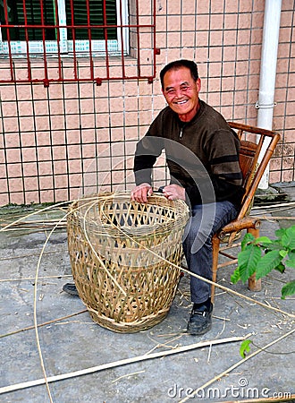 Pengzhou, China: Man Making Wicker Basket Editorial Stock Photo