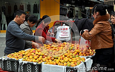 Pengzhou, China: People Buying Mangoes Editorial Stock Photo