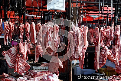 Pengzhou, China: Tian Fu Market Butcher Shop Stock Photo