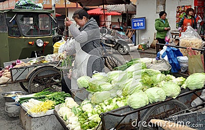 Pengzhou, China: Woman Selling Fresh Produce Editorial Stock Photo