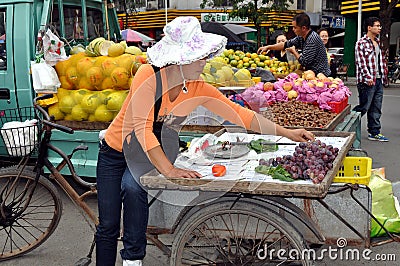 Pengzhou, China: Woman Selling Grapes Editorial Stock Photo