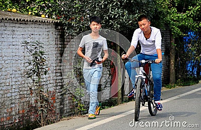 Pengzhou, China: Young Chinese Friends on Country Road Editorial Stock Photo