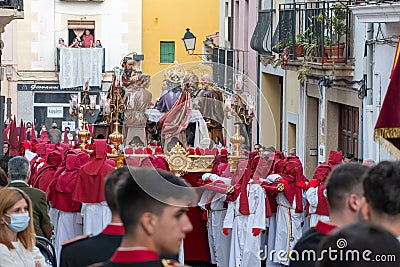 Penitents in the beginning of the Easter procession. Editorial Stock Photo