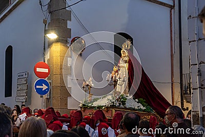 Penitents in the beginning of the Easter procession. Representation of the Holy Supper Editorial Stock Photo