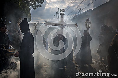 Penitents in an Easter procession during the Holy Week in Antigua, Guatemala Editorial Stock Photo