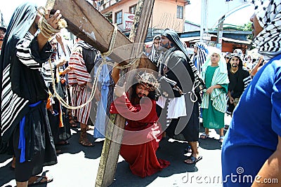 Penitents reenacting the Passion of Christ. Editorial Stock Photo