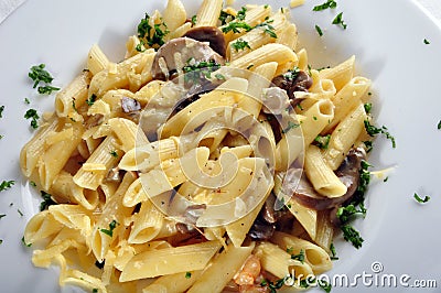 Penne pasta with shrimp Stock Photo