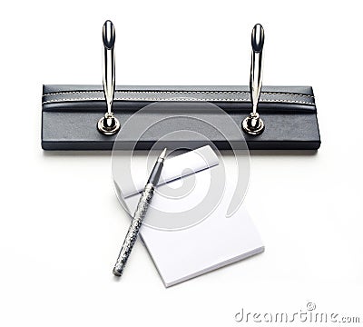 Pens holder and note book on white background Stock Photo