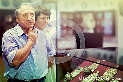 Pensioner family visiting historical exhibition in National Museum Editorial Stock Photo