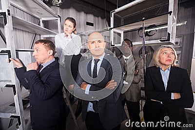 Pensive businesspeople solving conundrums Stock Photo