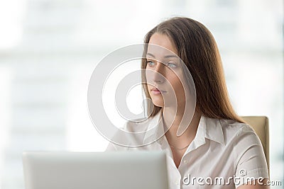 Pensive businesswoman thinking about solution Stock Photo