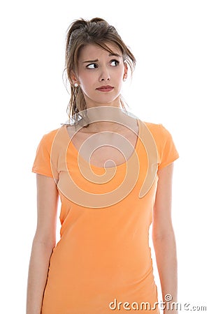 Pensive and doubtful young isolated woman wearing summer shirt. Stock Photo