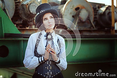 Pensive girl in the style of steampunk Stock Photo