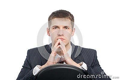 Pensive handsome young businessman Stock Photo