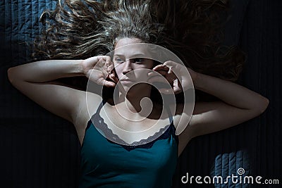 Pensive lady during sleepless night Stock Photo