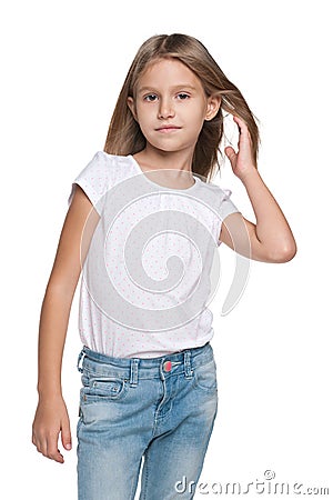 Pensive little girl with flowing hair Stock Photo