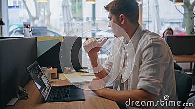 Pensive programmer looking window sitting computer table in morning closeup Stock Photo