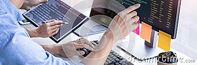 Pensive programmer working on on desktop pc programming code technologies or website design at office Software Development Company Stock Photo