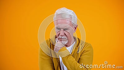 Pensive senior man thinking about life difficulties, solving problems, thoughts Stock Photo