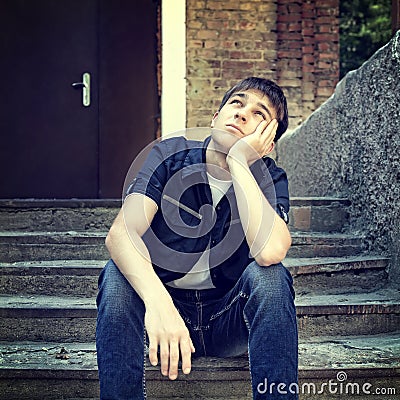 Pensive Teenager outdoor Stock Photo