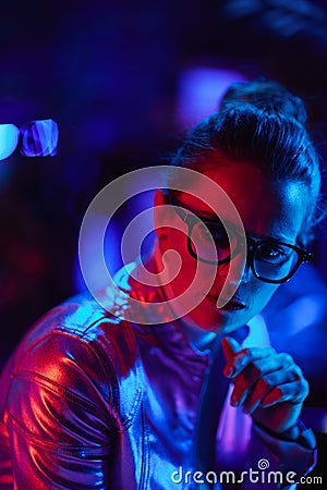 pensive trendy business woman in glasses Stock Photo