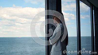Pensive woman think solution at panorama window closeup. Manager ponder question Stock Photo