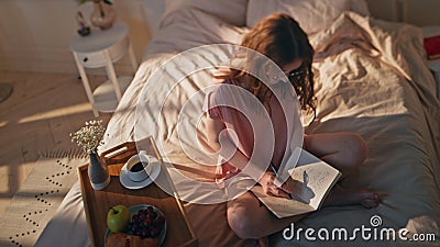 Pensive woman writing diary at home. Relaxed teenager dreaming sharing creative Stock Photo